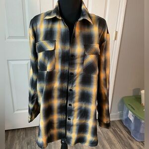Chocolate black and yellow shirt. Size M.